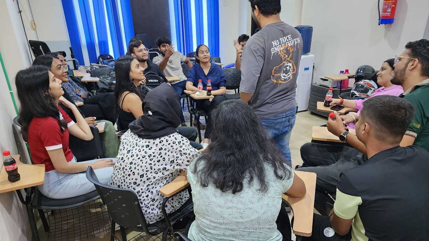 Ikshana Learning students celebrating together in classroom circle